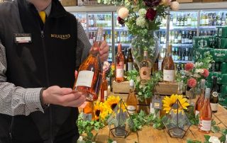 Shane with Bottle of Elixir Rose