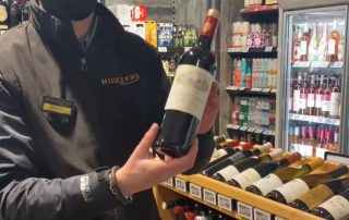 Shane with a bottle of Chateau Calendreau In Store