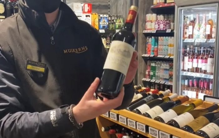 Shane with a bottle of Chateau Calendreau In Store