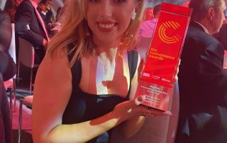 Enya McAteer photographed with Convenience Rising Star Award